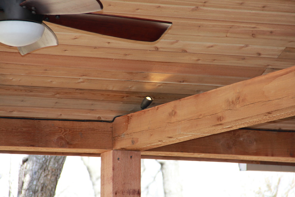 Deck lighting using low voltage under railing LED lights. Traditional