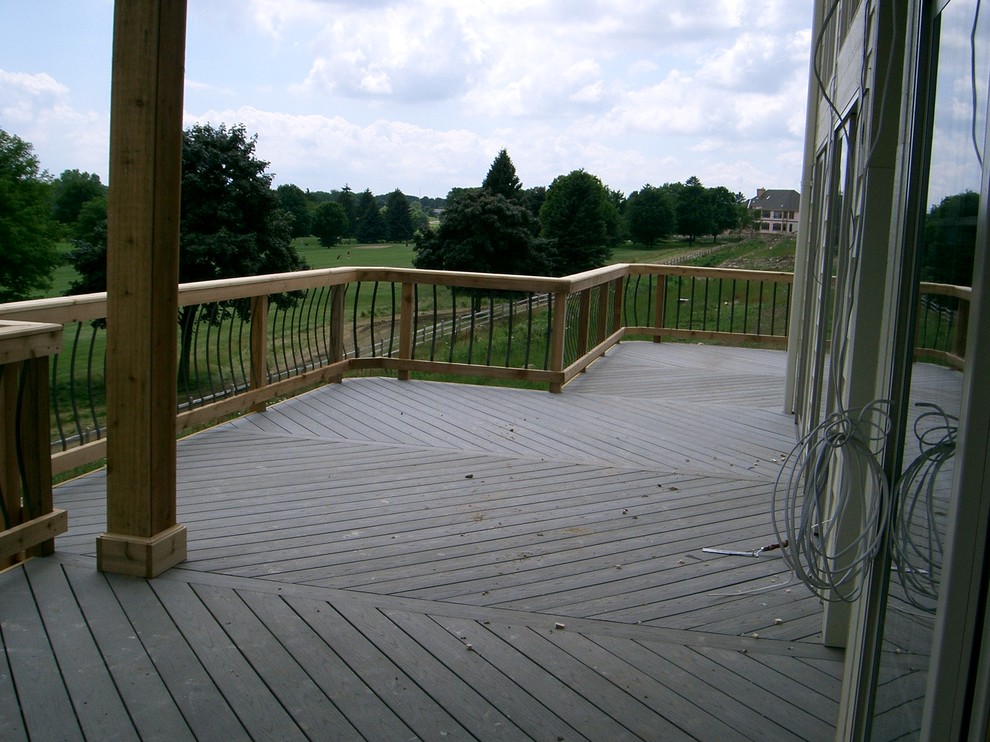 Inspiration for a large timeless backyard deck remodel in Milwaukee with no cover