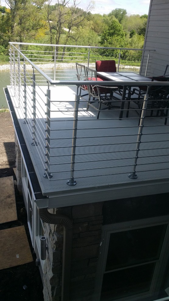 Deck - small modern rooftop deck idea in Minneapolis with no cover