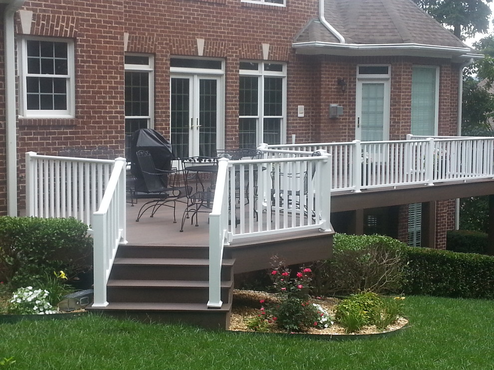 This is an example of a medium sized classic back terrace in Nashville with no cover.