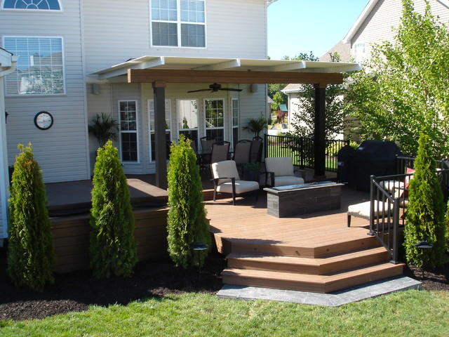 Deck with louvered roof, fire feature, and inset hot tub - Dardenne ...