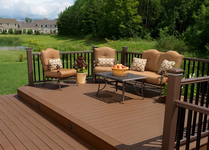 Example of a large trendy backyard deck design in Minneapolis