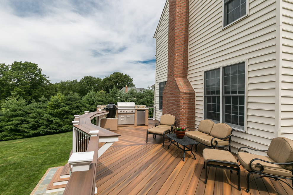 Large traditional back terrace in Baltimore with no cover.