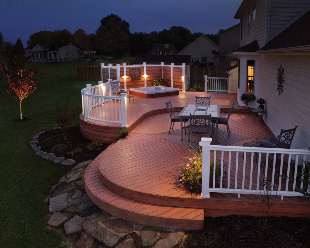 Inspiration for a mid-sized timeless backyard deck remodel in New York with no cover