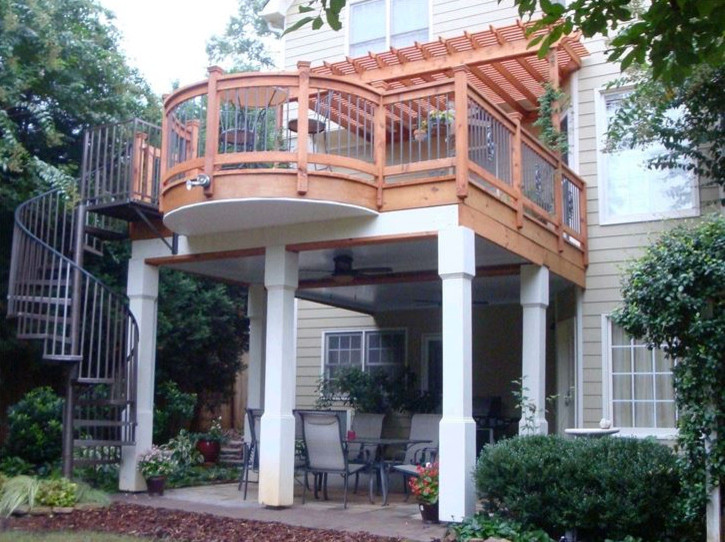 Design ideas for a medium sized classic back terrace in Atlanta with a roof extension.