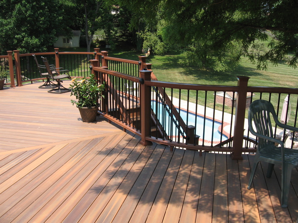 Mid-sized elegant backyard deck container garden photo in DC Metro with no cover