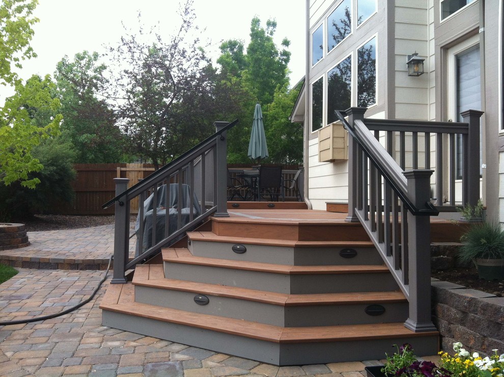 Deck - mid-sized traditional backyard deck idea in Denver with no cover