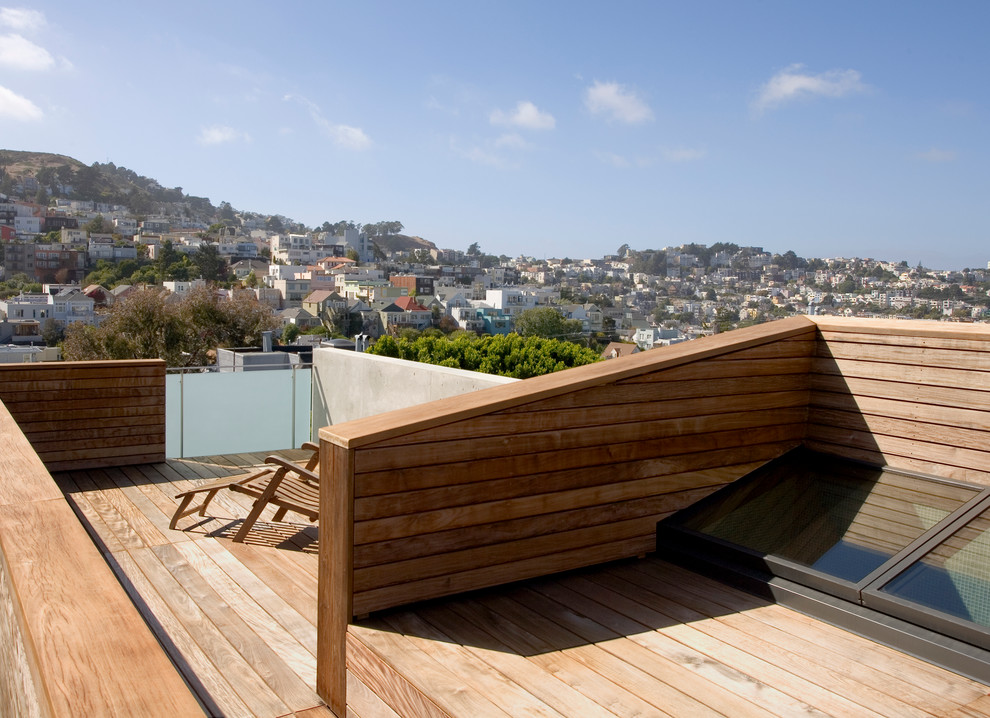 Diseño de terraza moderna de tamaño medio sin cubierta en azotea