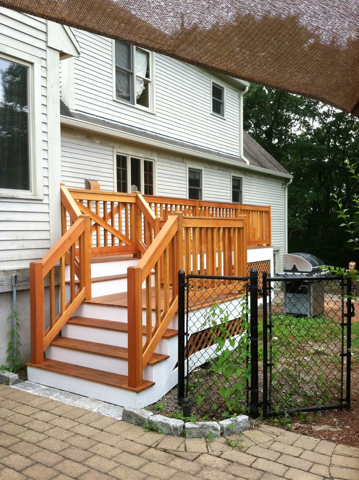 Inspiration for a large backyard deck remodel in Boston with no cover