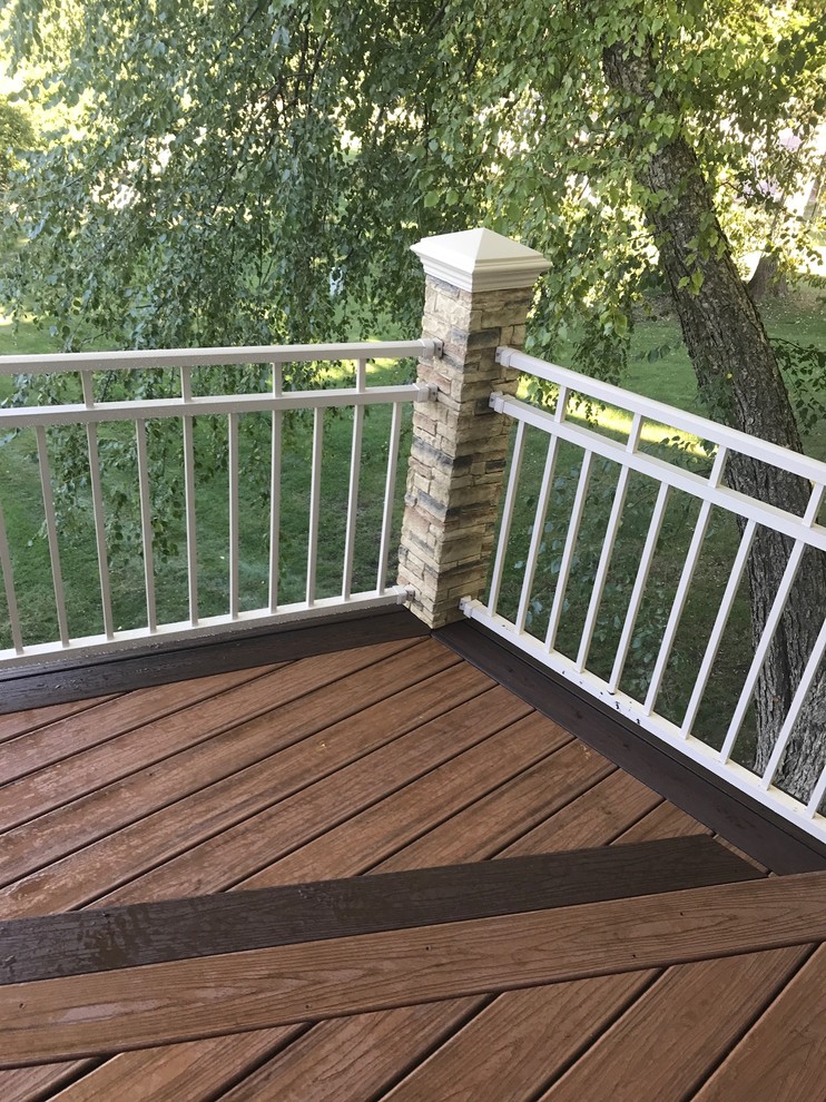 Example of a beach style deck design in Other