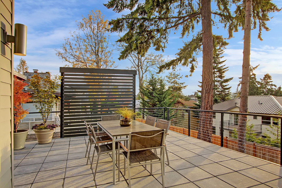 Photo of a medium sized contemporary back terrace in Seattle with no cover.