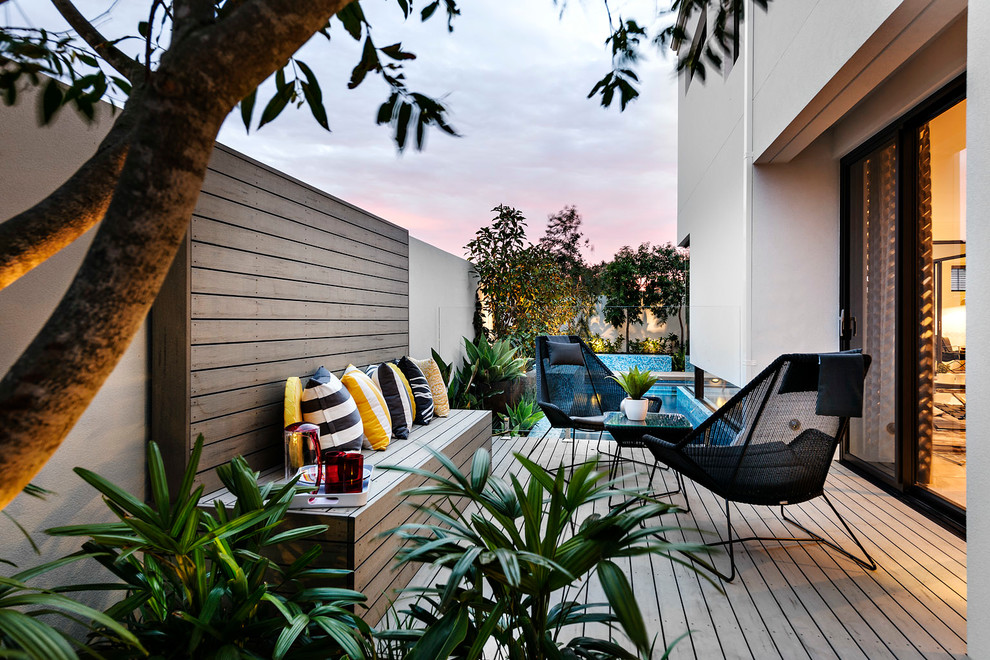 Contemporary back terrace in Perth with no cover.