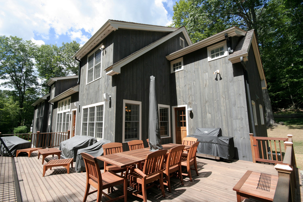 Example of a farmhouse deck design in New York with no cover