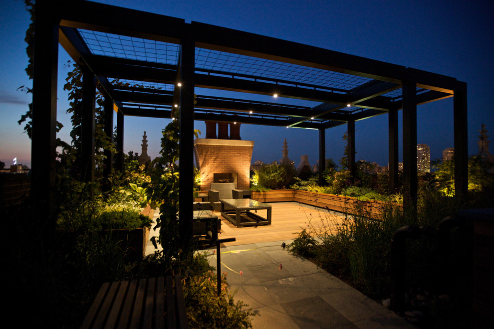 Large contemporary roof rooftop terrace in Chicago with a pergola and a bbq area.