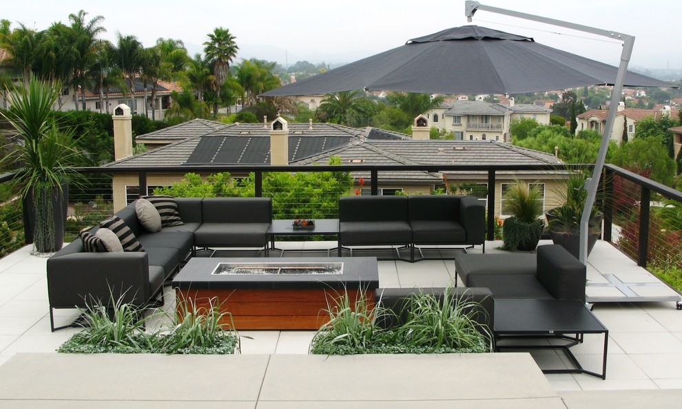 Design ideas for a contemporary roof rooftop terrace in San Diego with a fire feature.