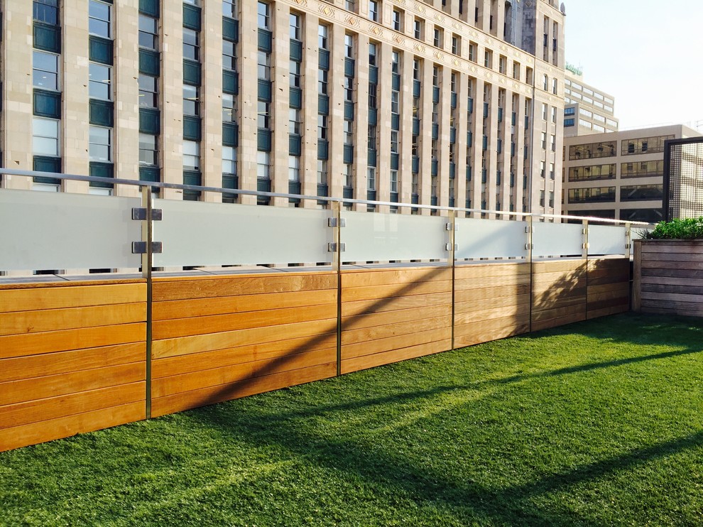 Inspiration for a medium sized traditional roof terrace in Chicago with a pergola.