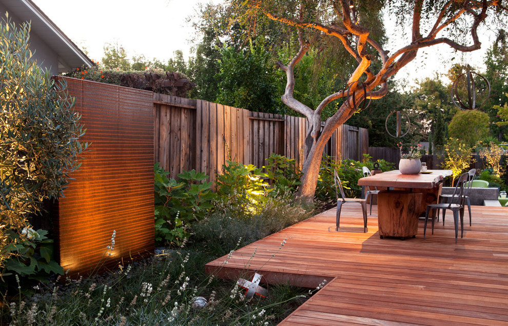 This is an example of a contemporary back terrace in San Francisco with no cover and fencing.