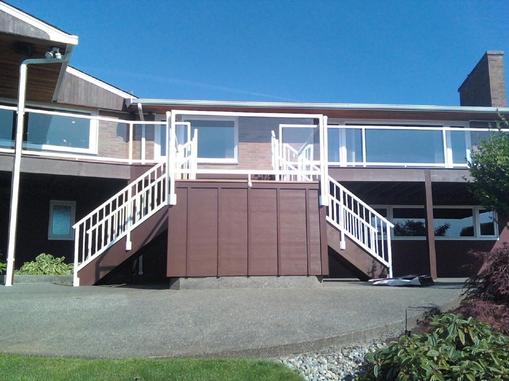 glass and metal railing Traditional Deck Seattle by Paul Haugen
