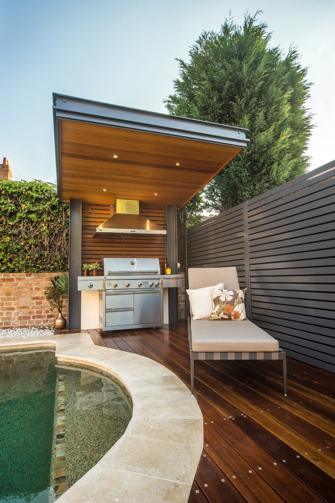 Photo of a contemporary terrace in Sydney with a bbq area.