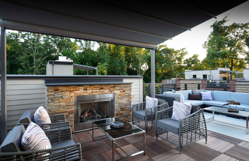 This is an example of a modern roof terrace in DC Metro with an awning.