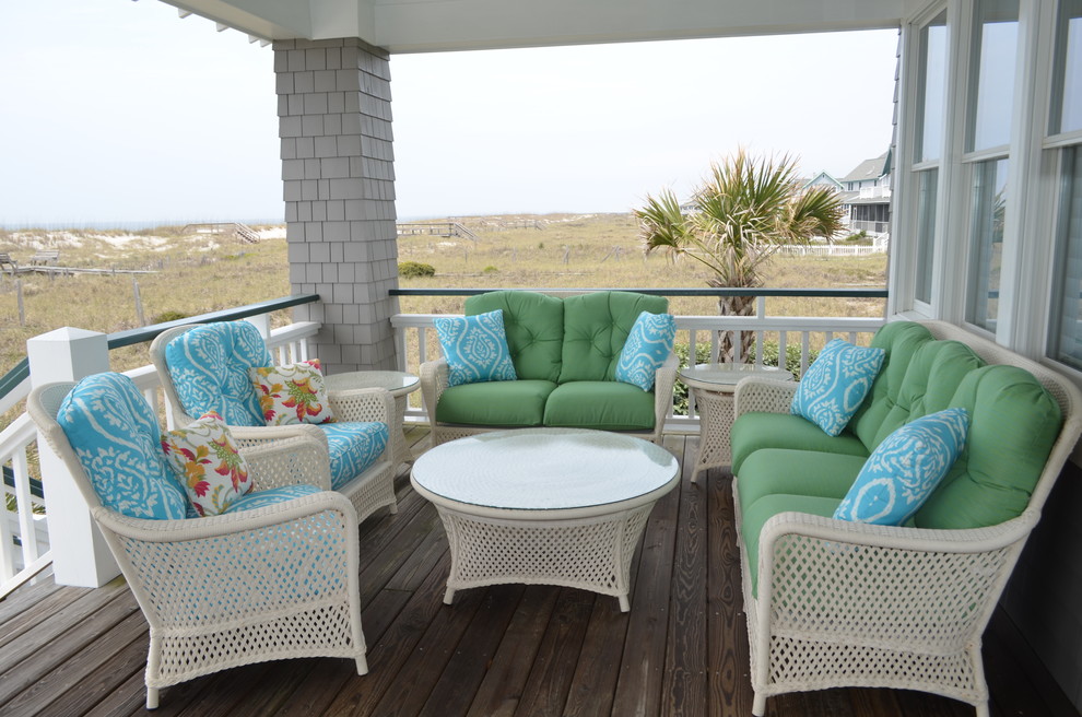 Design ideas for a coastal terrace in Other with a roof extension.
