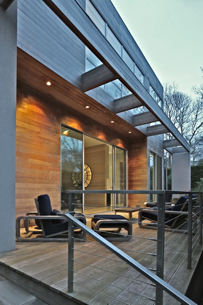 Design ideas for a contemporary terrace in New York with a pergola and feature lighting.
