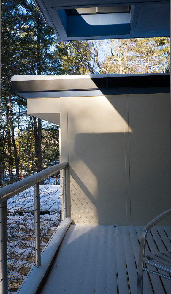 Réalisation d'une terrasse design avec une extension de toiture.