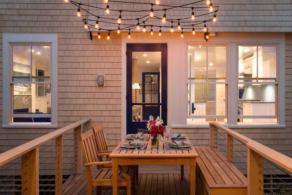 Photo of a small beach style back terrace in Portland Maine with no cover.