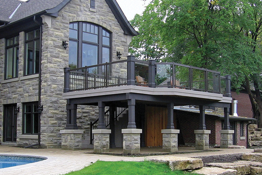 Modern back terrace in Toronto with no cover.