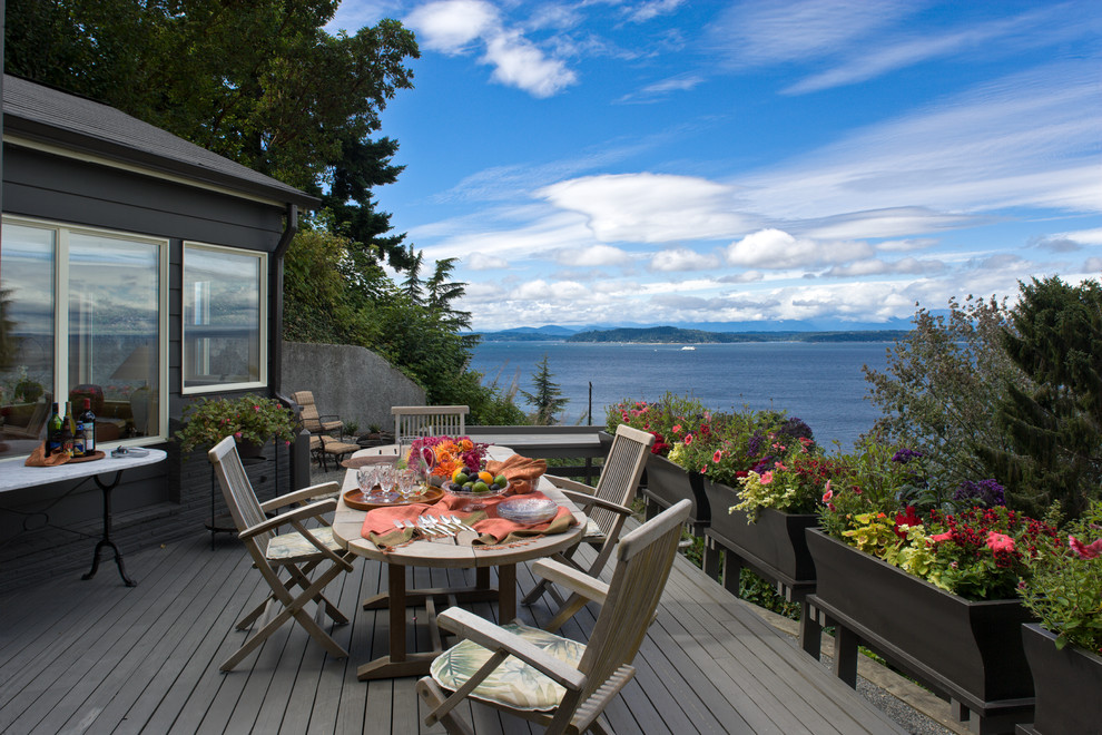 Design ideas for a large coastal back terrace in Seattle with no cover and a potted garden.