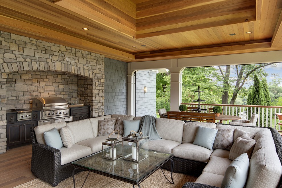 Example of a classic outdoor kitchen deck design in Minneapolis