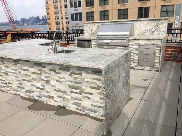 Throwback to this awesome outdoor kitchen countertop we installed with a  waterfall/mitered l…