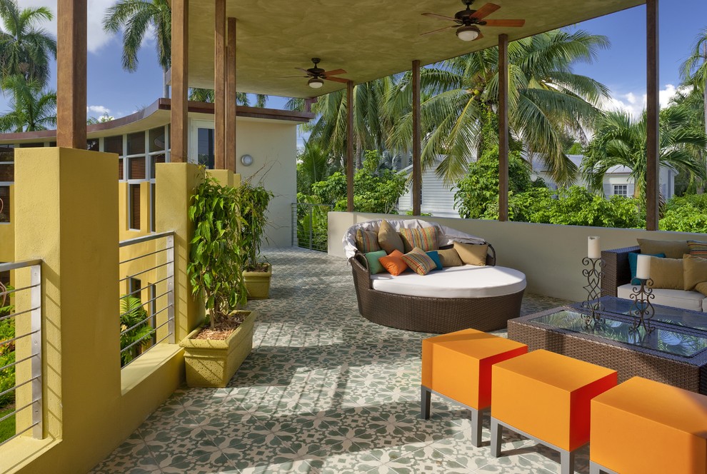 Inspiration for a contemporary terrace in Miami with a roof extension.