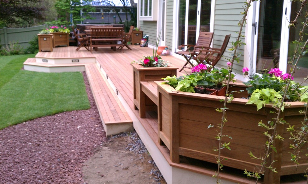 Ipe wood and composite deck with matching planters. - Traditional ...