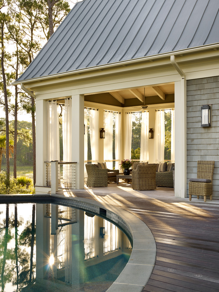 Deck - traditional backyard deck idea in Atlanta with a roof extension