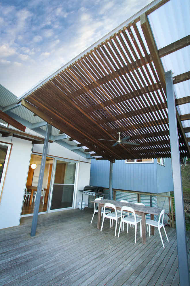 Deck - mid-sized contemporary deck idea in Sunshine Coast with an awning