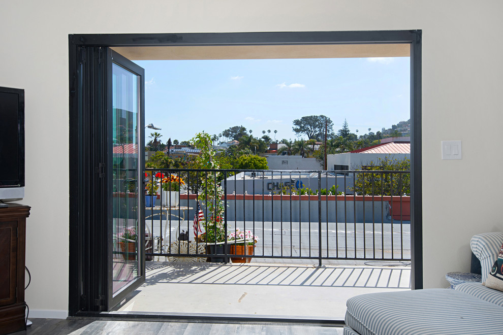 This is an example of a medium sized coastal roof terrace in San Diego with no cover.