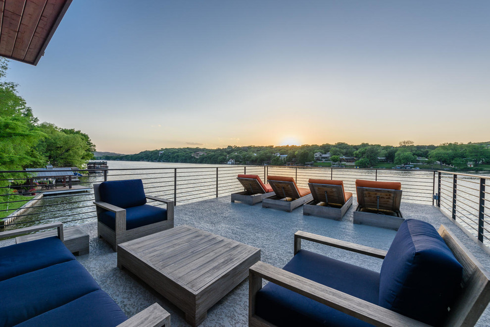 Inspiration for a large modern rooftop deck remodel in Austin with no cover