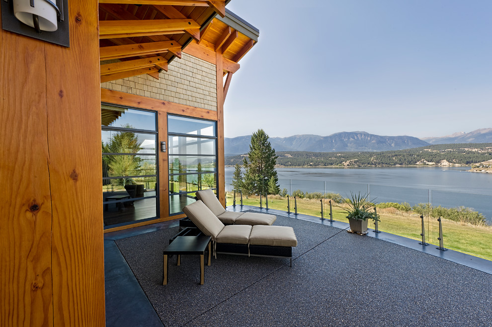 Inspiration for a contemporary backyard deck remodel in Calgary with no cover