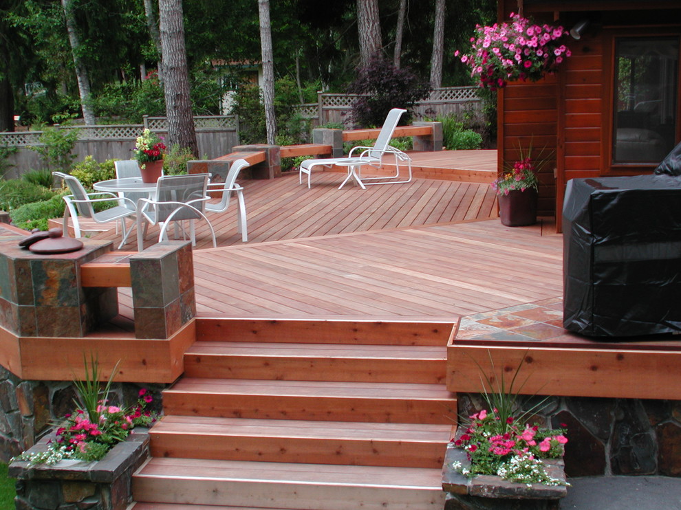 Mid-sized trendy backyard outdoor kitchen deck photo in Seattle with no cover