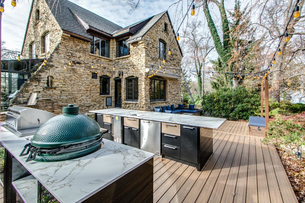 Design ideas for an expansive modern back terrace in Chicago with an outdoor kitchen and no cover.