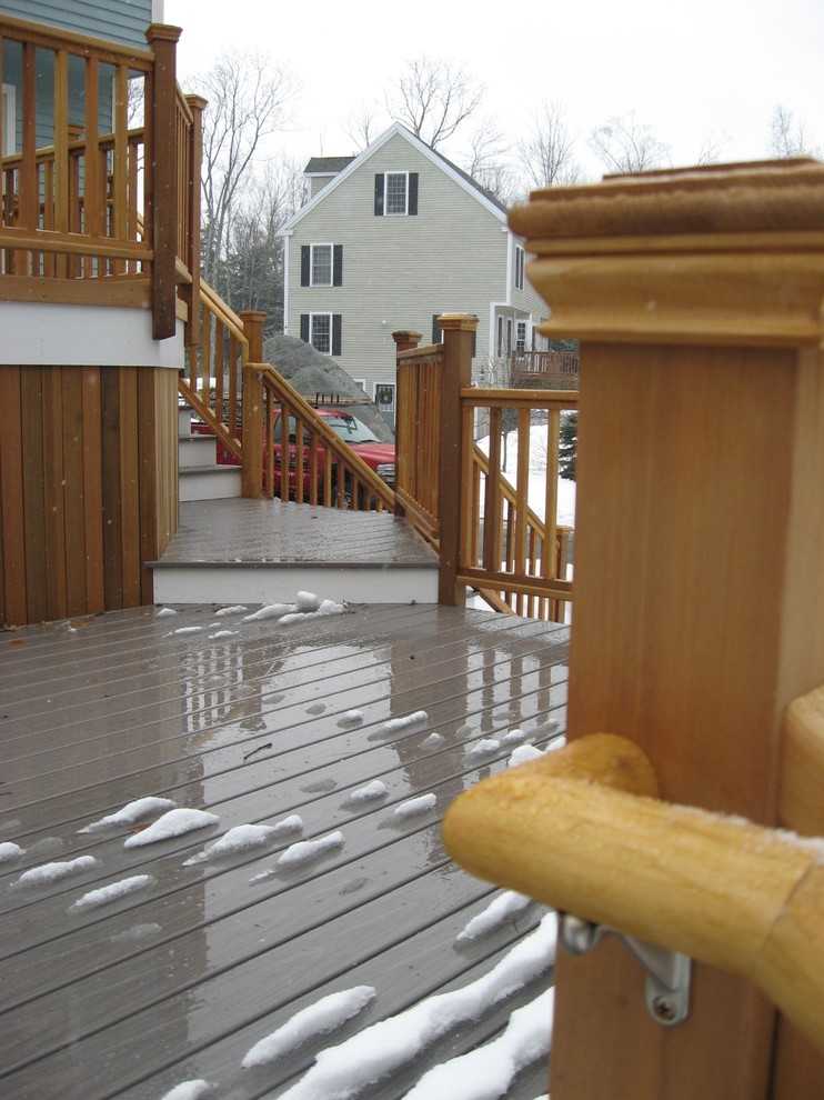 Deck - large traditional backyard deck idea in Boston with no cover