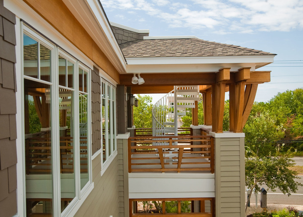 Aménagement d'un toit terrasse craftsman avec une extension de toiture.
