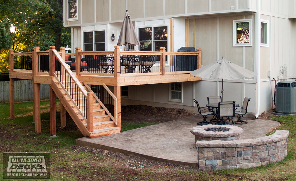 Leeder - Cedar deck in Kansas City with stamped concrete patio and firepit.  - Traditional - Deck - Kansas City - by All Weather Decks | Houzz