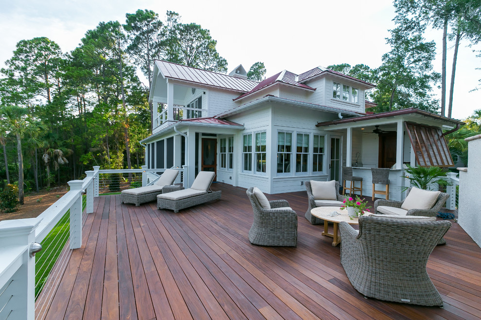 Elegant backyard deck photo in Charleston with no cover