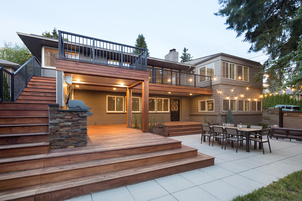 Inspiration for an expansive midcentury back terrace in Seattle with no cover.