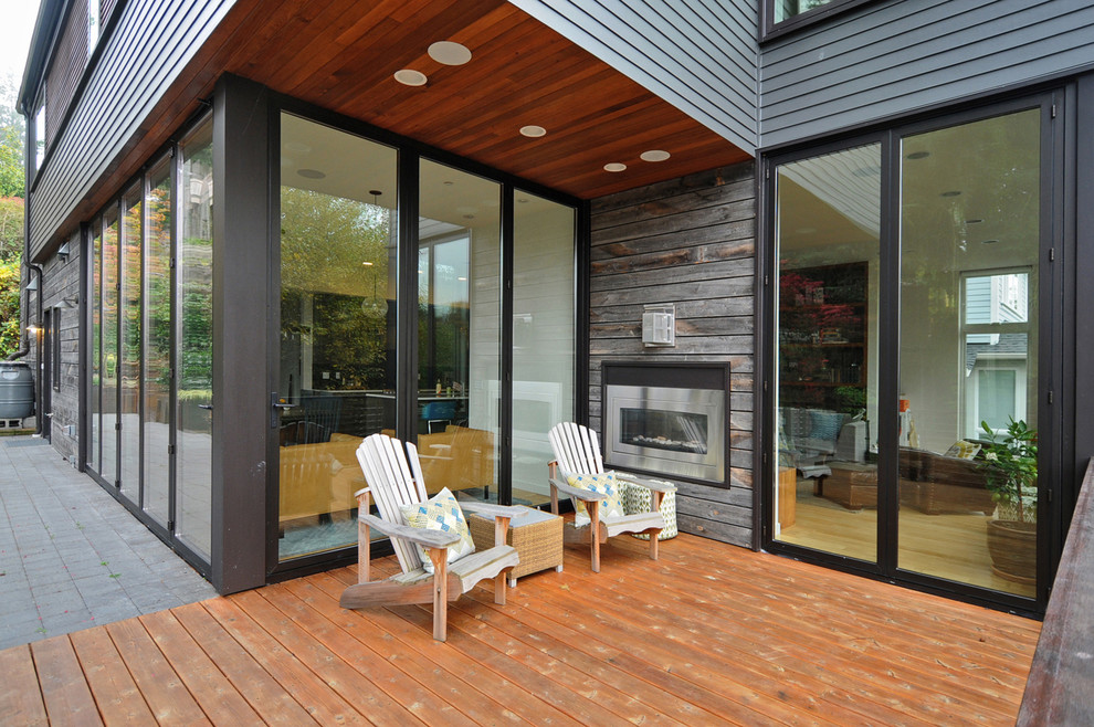 Deck - contemporary deck idea in Seattle with a fire pit