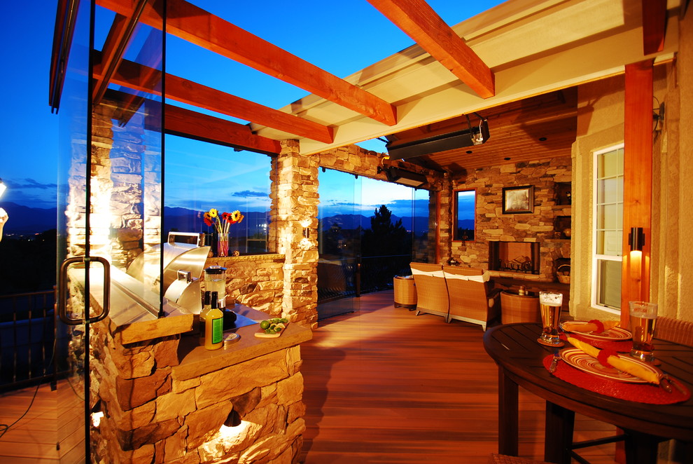 Deck - mid-sized craftsman deck idea in Denver with a fire pit and a pergola