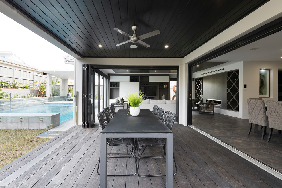 This is an example of a contemporary back terrace in Sydney with a roof extension.