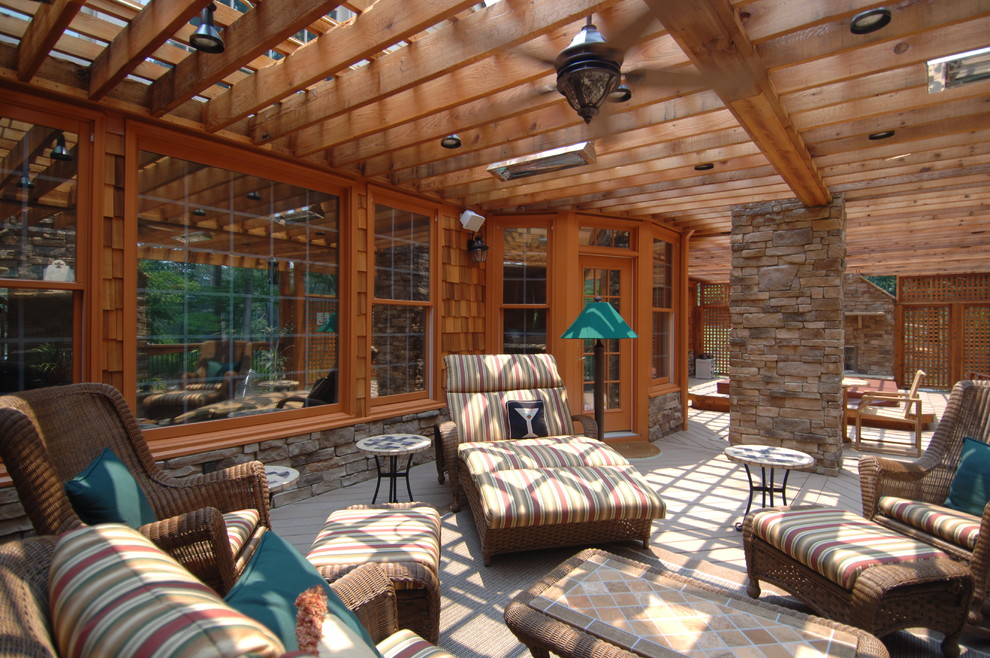 Inspiration for an expansive rustic back terrace in Atlanta with an outdoor kitchen and a pergola.